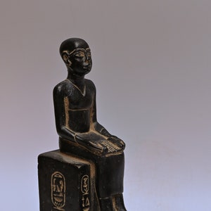 Statue of Egyptian art Seated statue of Imhotep holding an open papyrus scroll STONE made in egypt