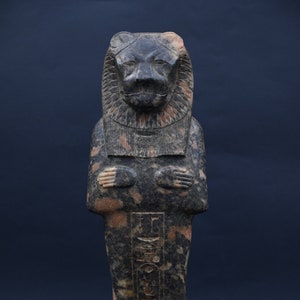 Statue of Egyptian goddess Sekhmet, lady of war carved from granite stone made in Egypt