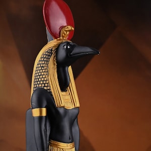Egyptian statue of Thoth ancient Egyptian God Of wisdom and Knowledge black & gold made in Egypt