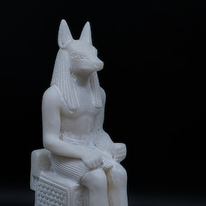 Egyptian statue of god Anubis seated heavy marble stone made in Egypt