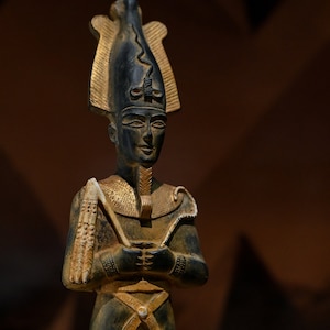 Egyptian statue of god Osiris, lord of the dead black stone made in Egypt
