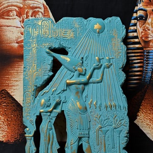 Wall hanging of King Akhenaten worshiping the god Aten, made of stone, made in Egypt