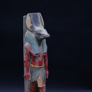Anubis - Egyptian statue of god of death Anubis colored in antique shape large statue, made in Egypt.
