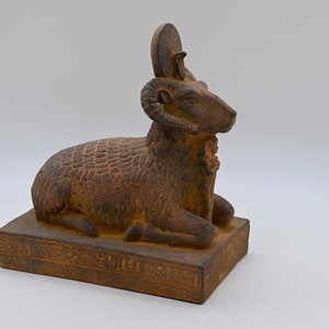 Egyptian statue of the god Khnum in the form of a ram, made of natural stone, made in Egypt