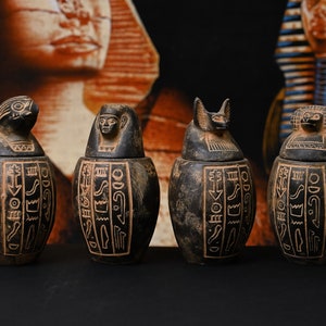 Set of four canopic jars organs Sculpture ancient Egyptian art heavy stone made in Egypt