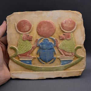 Egyptian relief of god of wisdom and knowlege god Thoth made from stone, made in Egypt