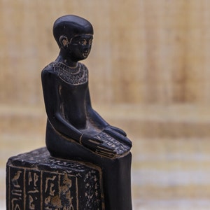 Statue of Egyptian art Seated statue of Imhotep god of midicine holding an open papyrus scroll STONE made in egypt