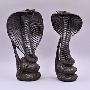 Statue of goddess Wadjet the cobra, and she is the patroness and  the joint protector of all Egypt made of stone Made in Egypt.