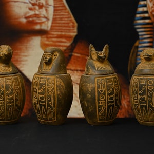 Set of four canopic jars organs Sculpture ancient Egyptian art heavy stone made in Egypt