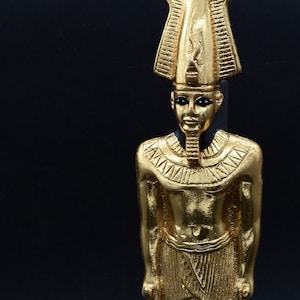 Egyptian statue of god Osiris, lord of the dead gold leaf made in Egypt