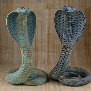 Statue of goddess Wadjet the cobra, and she is the patroness and  the joint protector of all Egypt made of stone Made in Egypt.