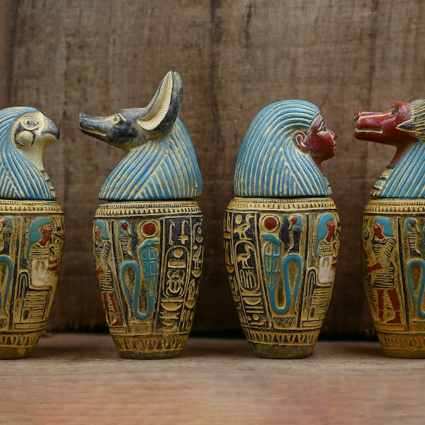 Conjunto de cuatro vasos canopos órganos Escultura arte egipcio antiguo piedra pesada hecha en Egipto