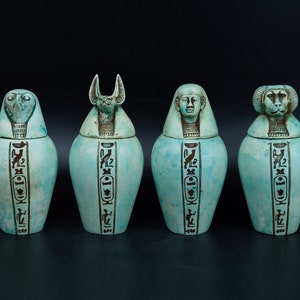 Set of four canopic jars organs Sculpture ancient Egyptian art heavy made from stone ( Egyptian Mythology / sons of Horus )  made in Egypt