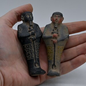 Small sculpture of the god of craftmen, Ptah, a statue made of stone, made in Egypt