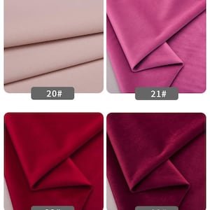 May include: Four fabric swatches in different colors: light pink, pink, red, and burgundy. The swatches are labeled with numbers 20, 21, 22, and 23.