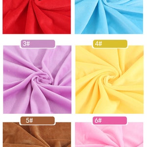 May include: Six fabric swatches in different colors. The swatches are arranged in two rows of three. The colors are red, light blue, lavender, yellow, brown, and pink.