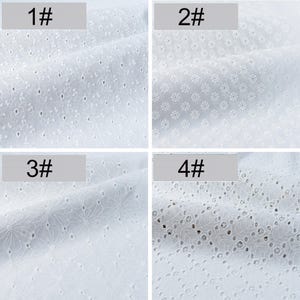 May include: A four-panel grid displaying white eyelet fabric samples. Panel 1# shows small floral cutouts, 2# features dense daisy patterns, 3# displays large outlined flower motifs, and 4# presents a leaf-like design with intricate eyelet detailing.