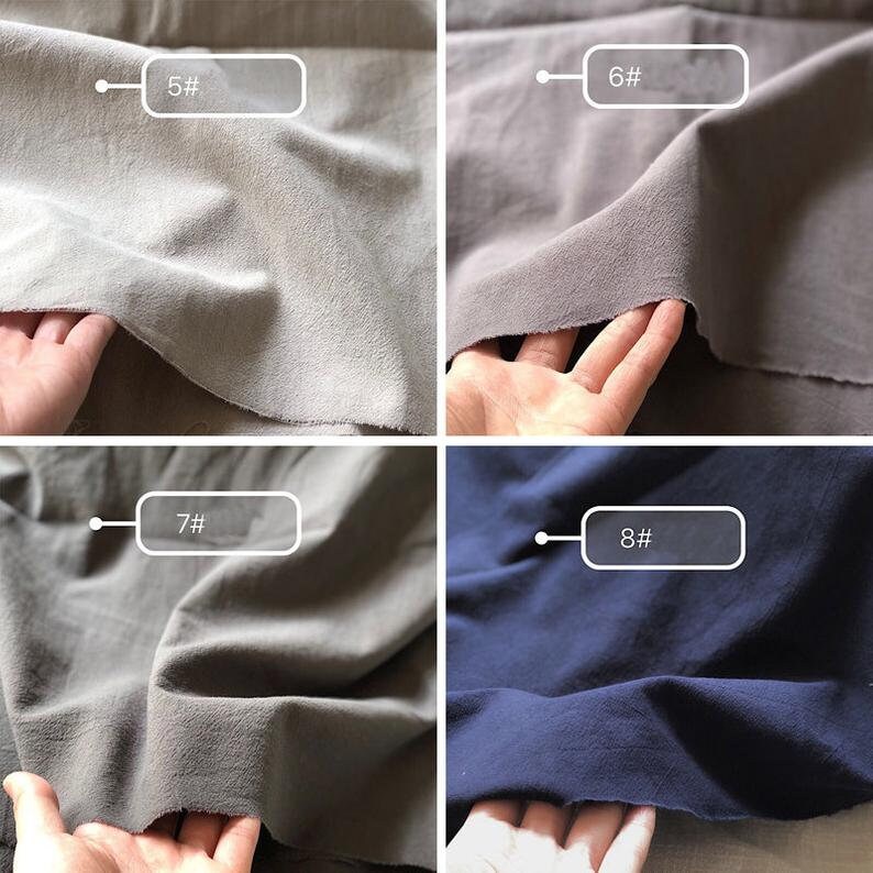 May include: Four fabric swatches in different colours: light grey, grey, dark grey, and navy blue. The swatches are labelled with numbers 5, 6, 7, and 8.