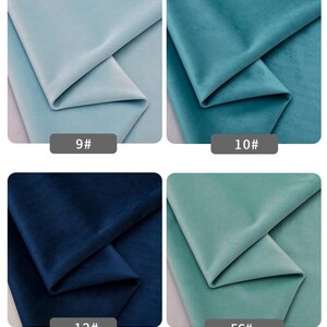 May include: Four fabric swatches in different colors: light blue, teal, dark blue, and light green. The swatches are folded in half and labeled with numbers: 9#, 10#, 12#, and 56#.