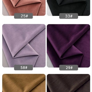 May include: Six fabric swatches in different colors, including pink, black, purple, light purple, brown, and dark brown. Each swatch is folded in half and labeled with a number: 25#, 33#, 58#, 29#, 31#, and 32#.