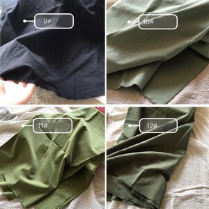 May include: Four fabric swatches, two black and two green, with numbers 9, 10, 11, and 12 printed on them.