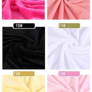 May include: Six fabric swatches in different colors. The swatches are arranged in two rows of three. The colors are pink, light pink, black, white, yellow, and light pink.