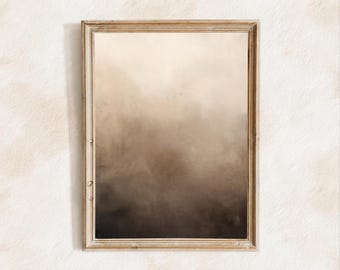 May include: A framed abstract painting with a light brown to dark brown gradient. The frame is a simple, light wood.