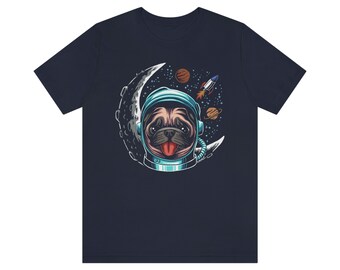 May include: A navy blue t-shirt with a graphic of a pug wearing an astronaut helmet in front of a crescent moon and stars.