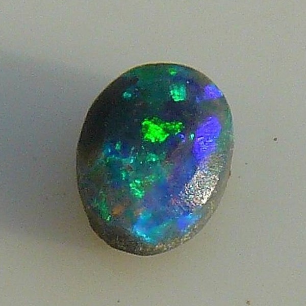 Black Opal - Lightning Ridge, New South Wales, Australia - 6x4x2mm / 0.4 Carats - Small but Bright - Stone is shaped but not polished