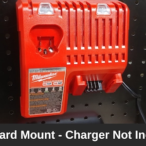 May include: Red Milwaukee M12 M18 charger pegboard mount. The charger is not included.