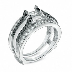 May include: A silver ring setting with a double band design. The outer band is set with small round white diamonds and black diamonds. The inner band is set with black diamonds.