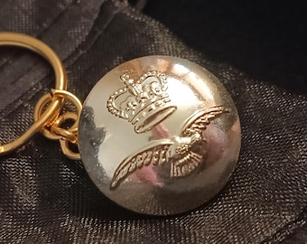 Genuine RAF Tunic Button Keyring on a gold coloured mount. Handmade in the UK.