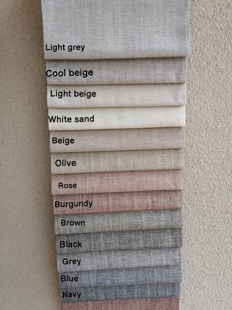 May include: A swatch card showing 13 different fabric colors, including light grey, cool beige, light beige, white sand, beige, olive, rose, burgundy, brown, black, grey, blue, and navy.