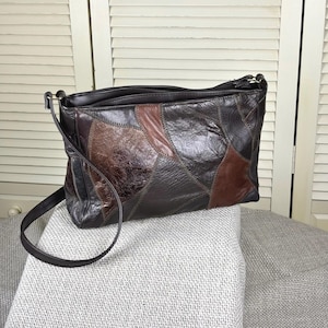 May include: A rustic wooden sign with the text "Welcome" in a handwritten style. The sign is painted white with a distressed finish, and features a decorative floral element in the corner. Perfect for a front door or entryway.