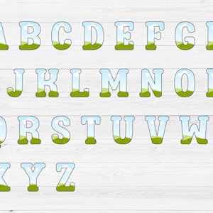 May include: A full alphabet set, each letter is designed with a landscape theme. The letters are outlined in black, with a blue sky and green hills filling the inside. The background is a white wood grain.