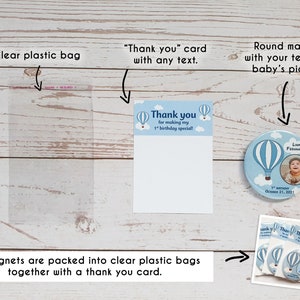 May include: A set of three round blue and white magnets with a hot air balloon design. Each magnet features a different image of a hot air balloon and the text "Thank you for making my 1st birthday special!"  The magnets are packaged in a clear plastic bag with a thank you card.