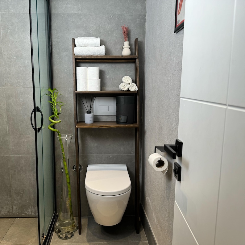 We combine Bathroom Shelves Storage with A Over the Toilet Ladder Shelf,. Here is SWooden Above Toilet Back Paper Stand Organizer as a easy to assemble over toilet storage as a bath rooms furniture!