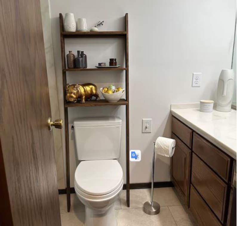 We combine Bathroom Shelves Storage with A Over the Toilet Ladder Shelf,. Here is SWooden Above Toilet Back Paper Stand Organizer as a easy to assemble over toilet storage as a bath rooms furniture!