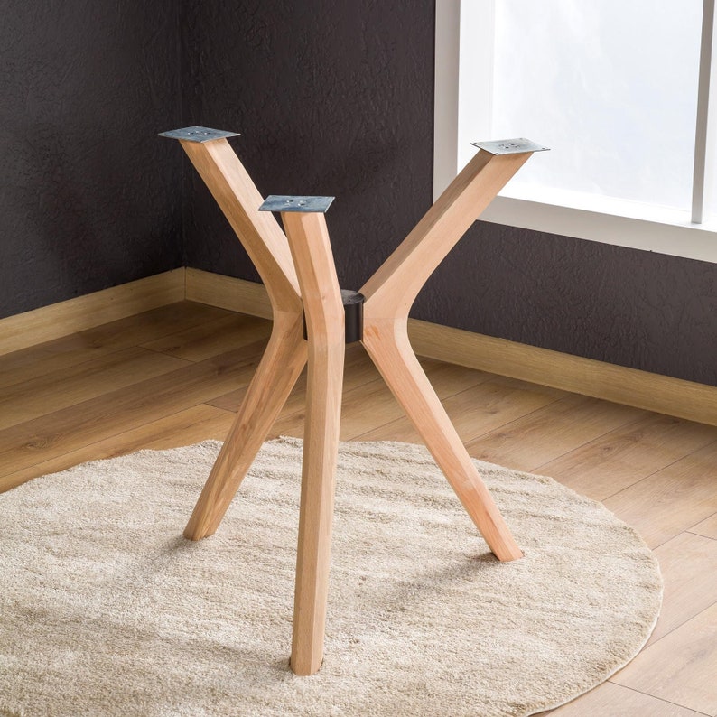 Solid Beech Wood Triple Butterfly Table Leg 🪵 
Bring the warmth of natural wood and modern design into your home! This handcrafted table leg perfectly complements round tabletops made of glass, epoxy, marble, or solid wood. Its sturdy construction and elegant style add both charm and function to any space.