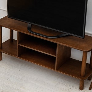 We combine Tv Stand with Storage Console with Modern Walnut Television Livingroom Furniture for Indoor. Here is Wooden Media Turnable Stand Unit Cabinet as a Home Entertainment Center!