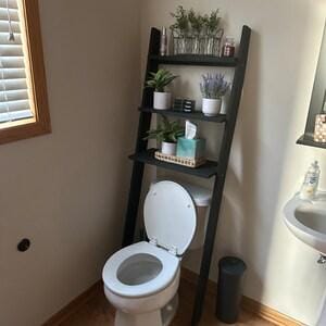 We combine Bathroom Shelves Storage with A Over the Toilet Ladder Shelf,. Here is SWooden Above Toilet Back Paper Stand Organizer as a easy to assemble over toilet storage as a bath rooms furniture!