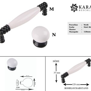 May include: White porcelain cabinet knob with a black base and a 128 mm center-to-center measurement. The knob is shown with a matching handle.