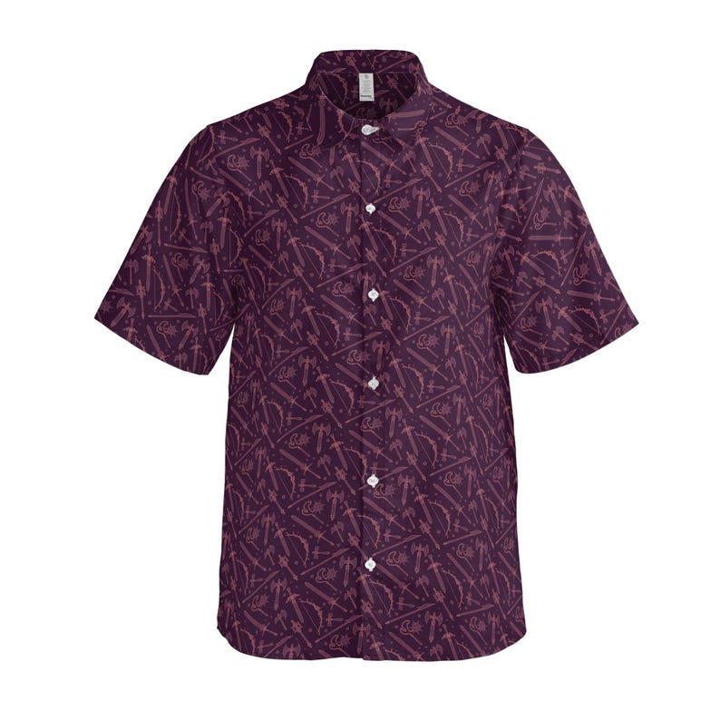 May include: Short-sleeved button-down shirt in a deep purple hue, featuring a repeating pattern of stylized weapons such as swords, bows, and axes. The shirt has a classic collar and white buttons.