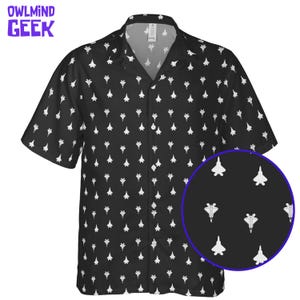 May include: Black short-sleeved shirt featuring a white jet fighter pattern. The shirt has a classic collar and buttons. The text "OWLMIN GEEK" is in the upper left corner. A close-up shows the jet fighter design.