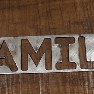 FAMILY surrounded by a Heart - Metal Wall Art