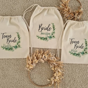 Personalized backpack with eucalyptus watercolor wreath in boho style + text of your choice | JGA bridal pouch