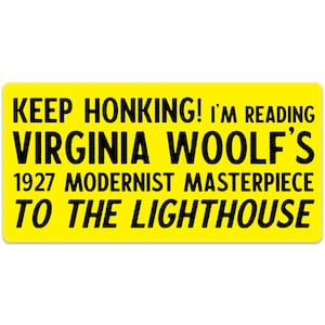 May include: Yellow sign with black text that reads "KEEP HONKING! I'M READING VIRGINIA WOOLF'S 1927 MODERNIST MASTERPIECE TO THE LIGHTHOUSE"