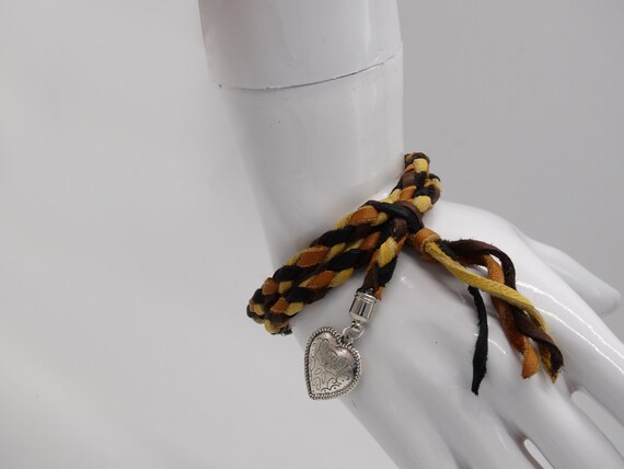 Western style braided leather bracelet with silver heart charm