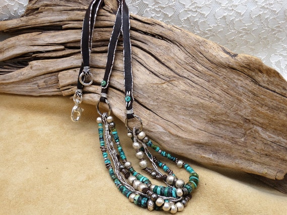Hand crafted necklace in American turquoise, Ethiopian silver beads and genuine deer hide
