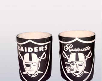 Las Vegas Raiders NFL Ceramic Couples Coffee Mugs - White & Black Raider and Raiderette Male / Female